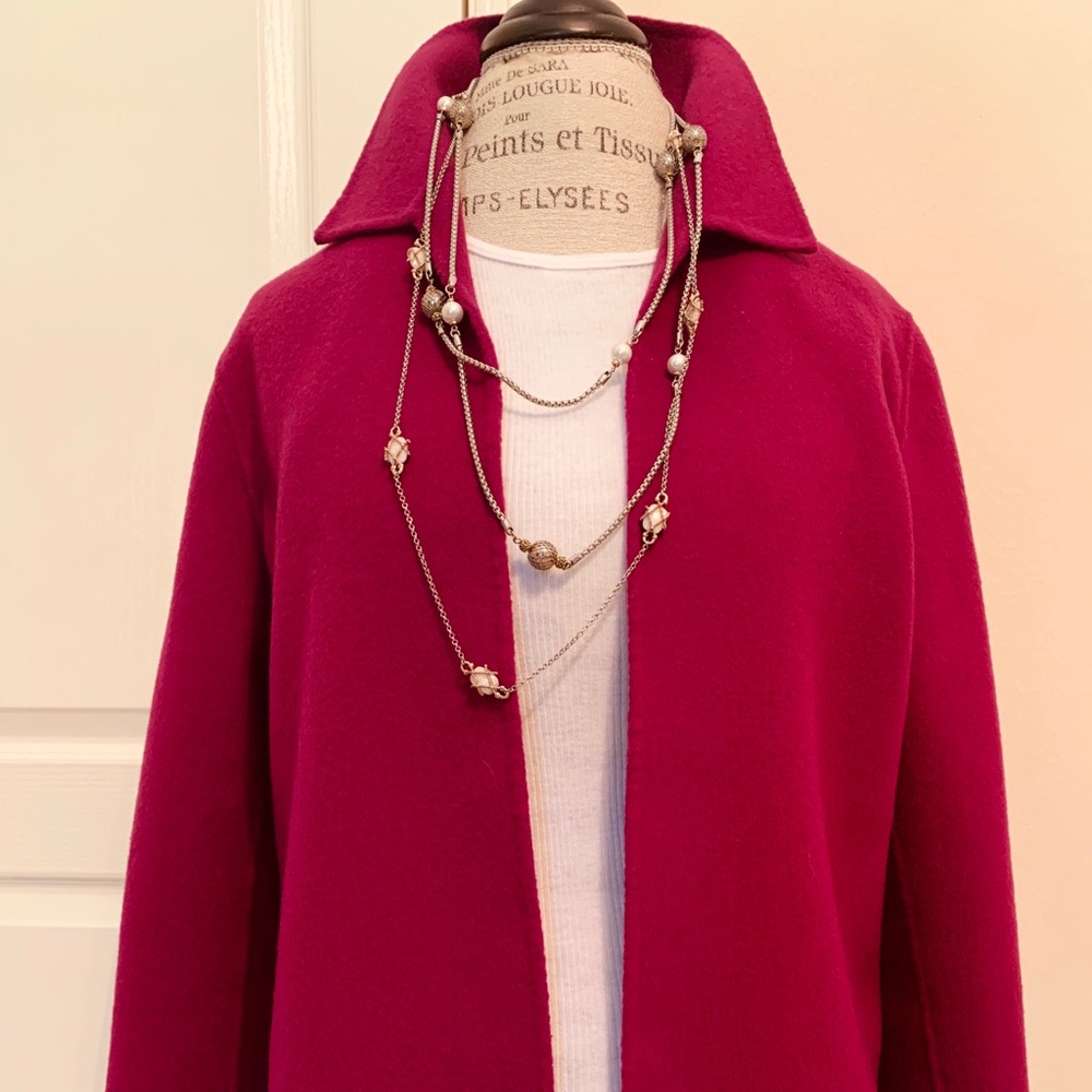 Elegant wool jacket with collar by Dana Buckman.
